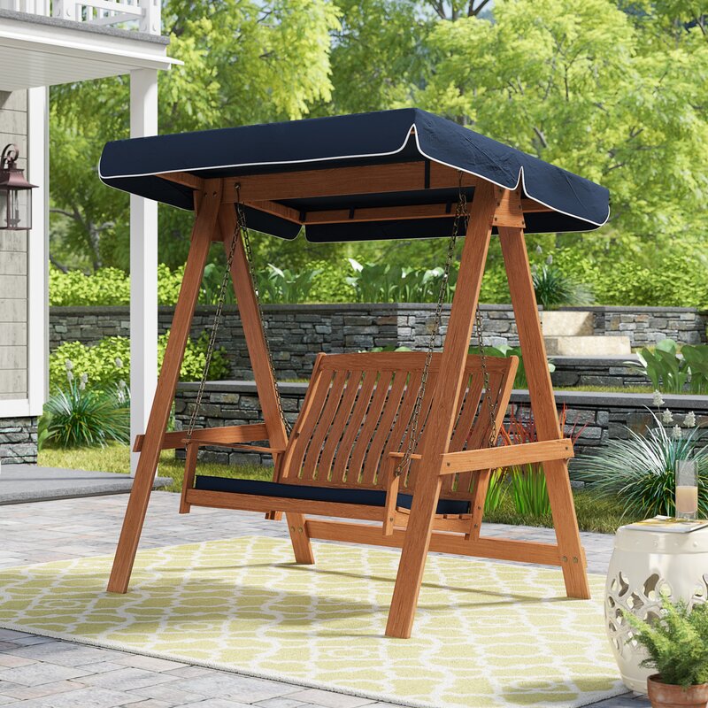 A simple 2 person porch swing with canopy and seat base cushion